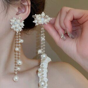 Pearl exaggerated tassel earrings